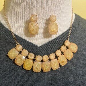 Gold tone necklace with matching studded earrings